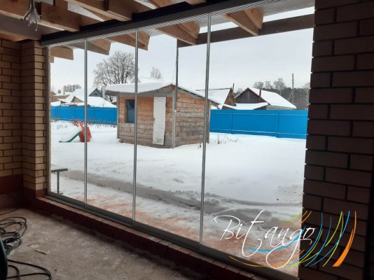 Безрамное остекление террасы